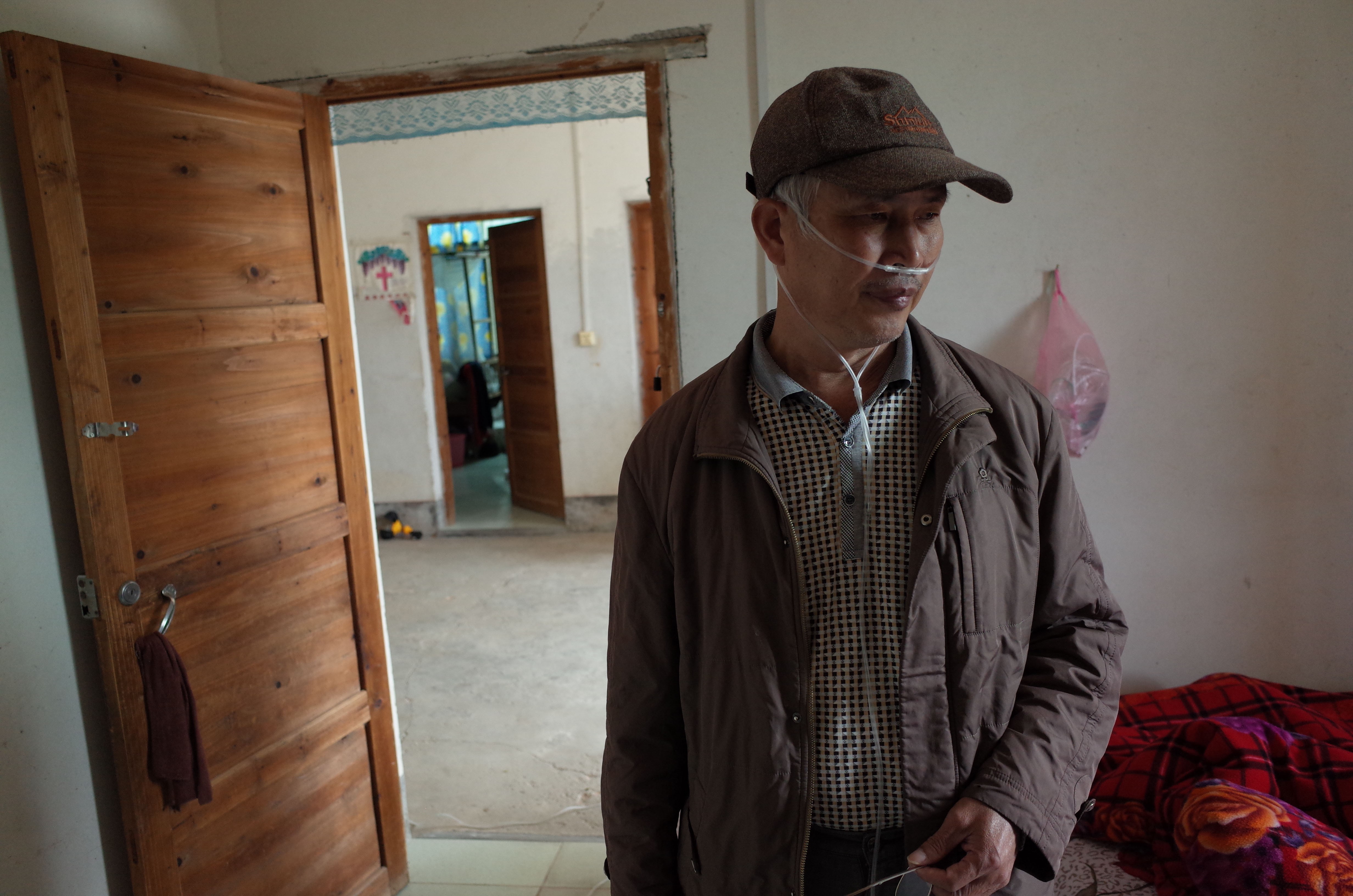 Wang Quanlong, one of about 80 sick drillers who threatened mass suicide if Shenzhen authorities did not pay compensation for pneumoconiosis. Photo: Washington Post photo by Gerry Shih