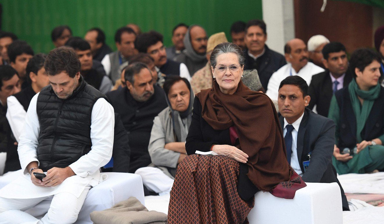 Congress president Sonia Gandhi and ex-party president Rahul Gandhi (L) attend a sit-in protest. Photo: AFP
