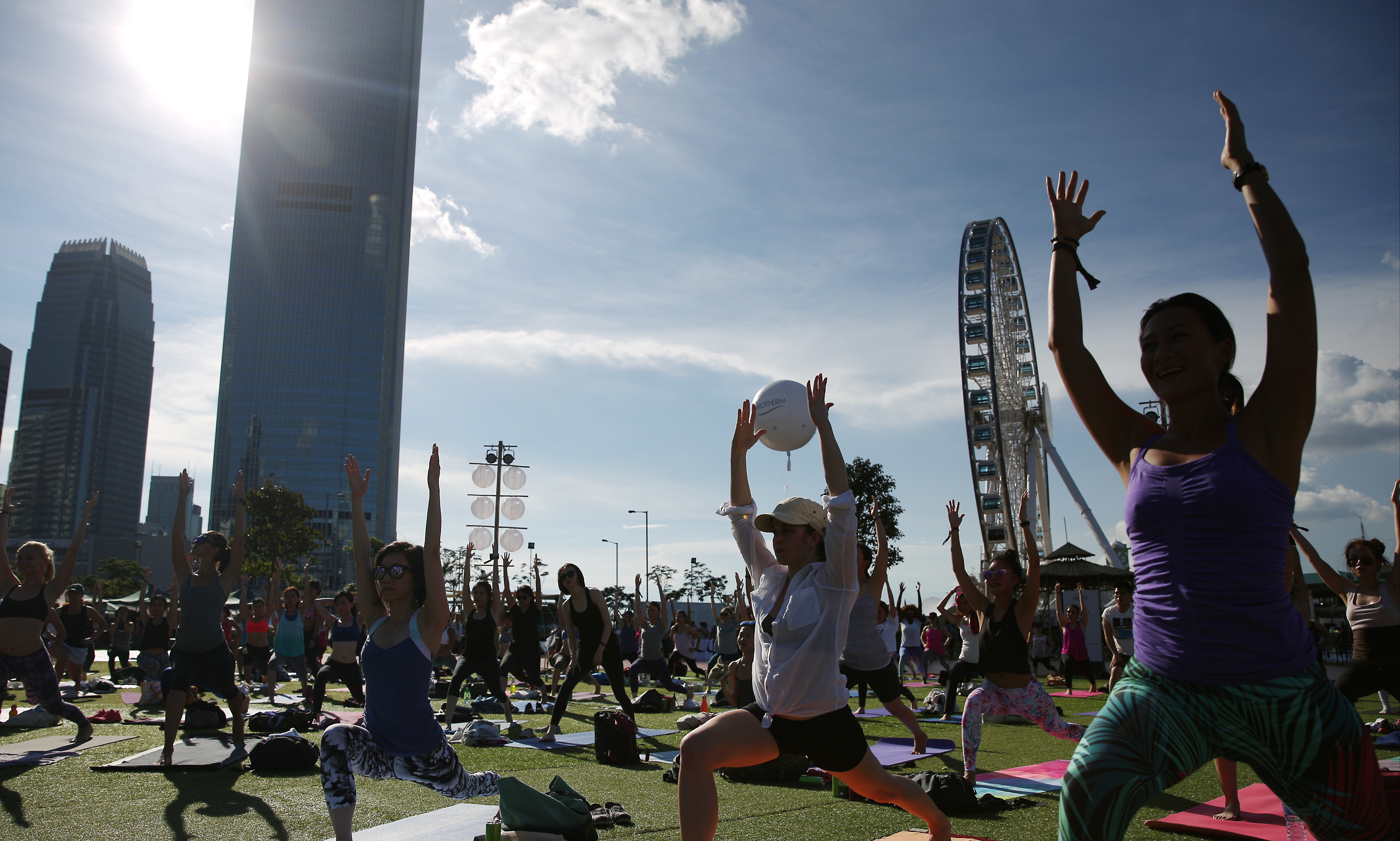 There are plenty of opportunities to do yoga in public places in Hong Kong with groups like HK Outdoor Yoga popping up at public parks. Photo: Sam Tsang