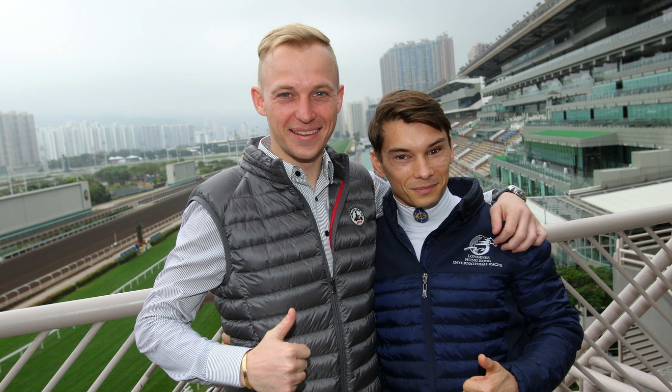 Tony Piccone with fellow jockey Alexis Badel at Sha Tin.