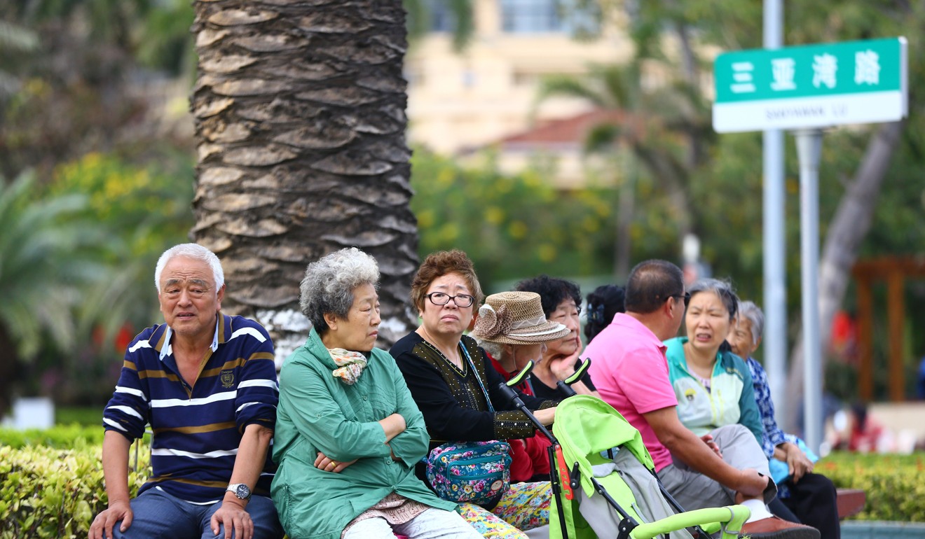 Elderly people rest in Sanya, Hainan province, whose balmy climate has become a magnet for retirees, on February 15, 2017. People over 65 now comprise 11.4 per cent of China’s population. Photo: AFP