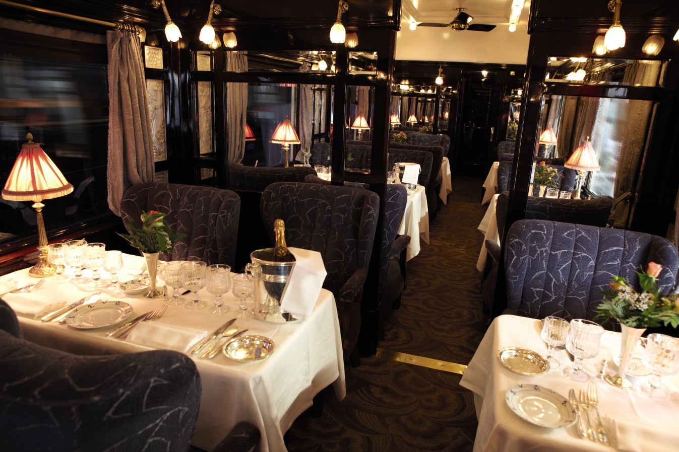 The Venice Simplon-Orient-Express restaurant car set for dinner service. Photo: Handout