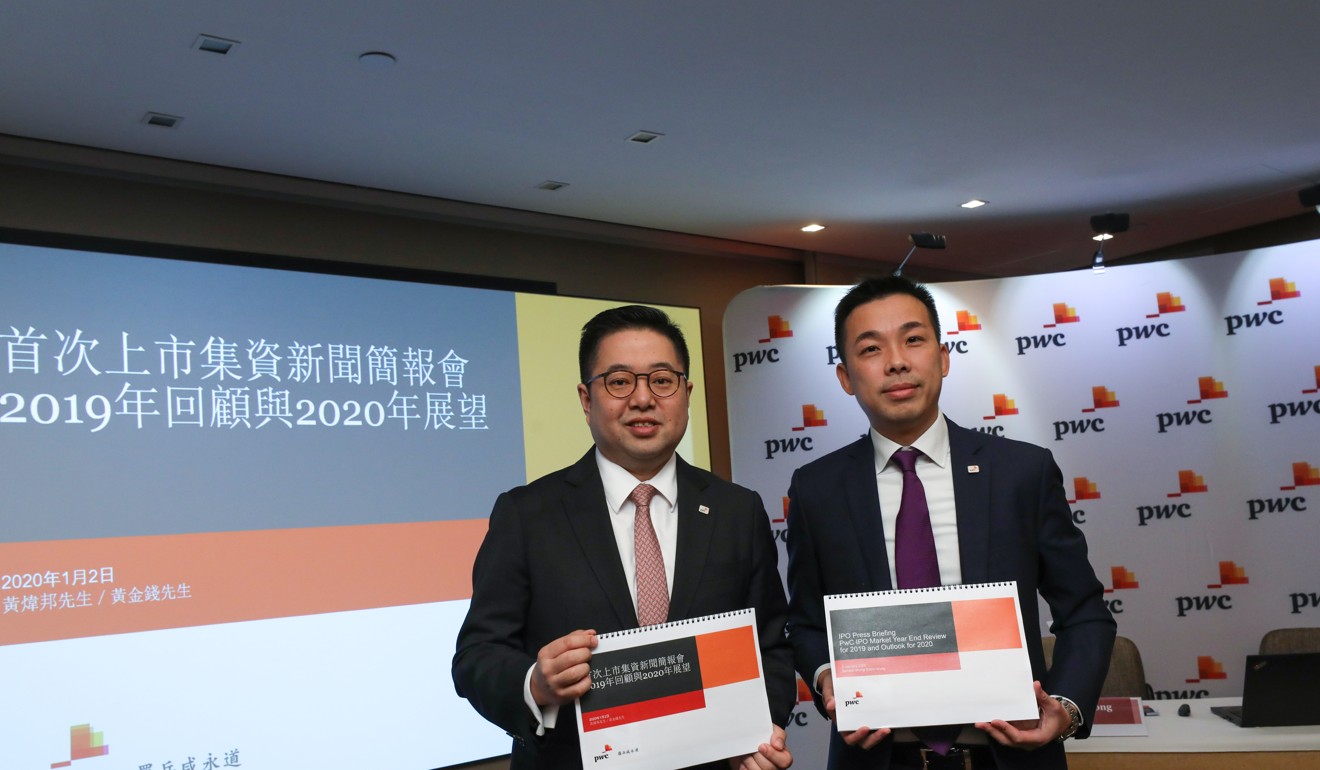 Benson Wong, left, and Eddie Wong of PwC Hong Kong present the accounting firm’s ‘IPO Market Year End Review for 2019 and Outlook for 2020’ report on Thursday. Photo: Nora Tam