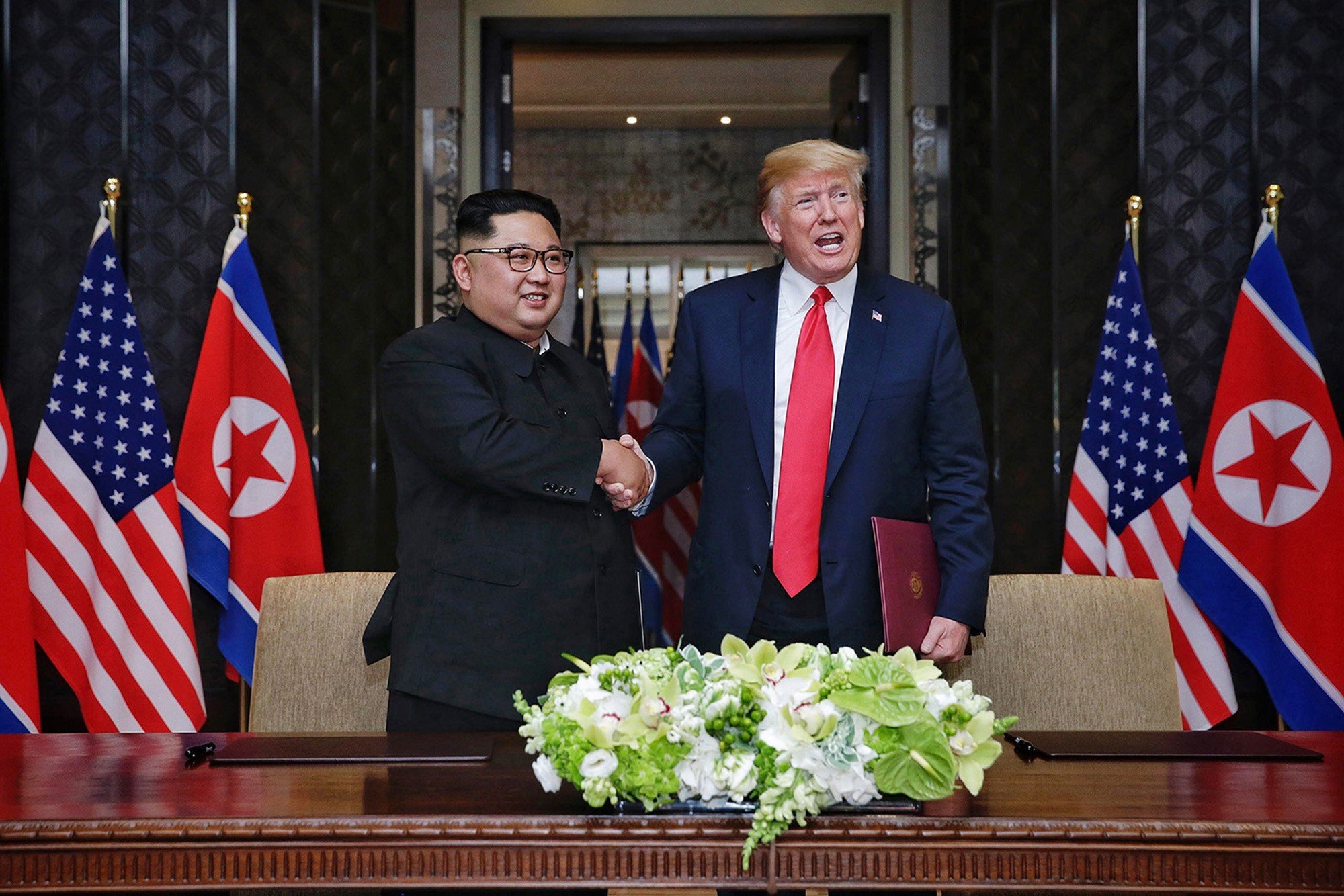 President Donald Trump and North Korean leader Kim Jong-un during their 2018 summit in Singapore. Photo: Ministry of Communications Singapore