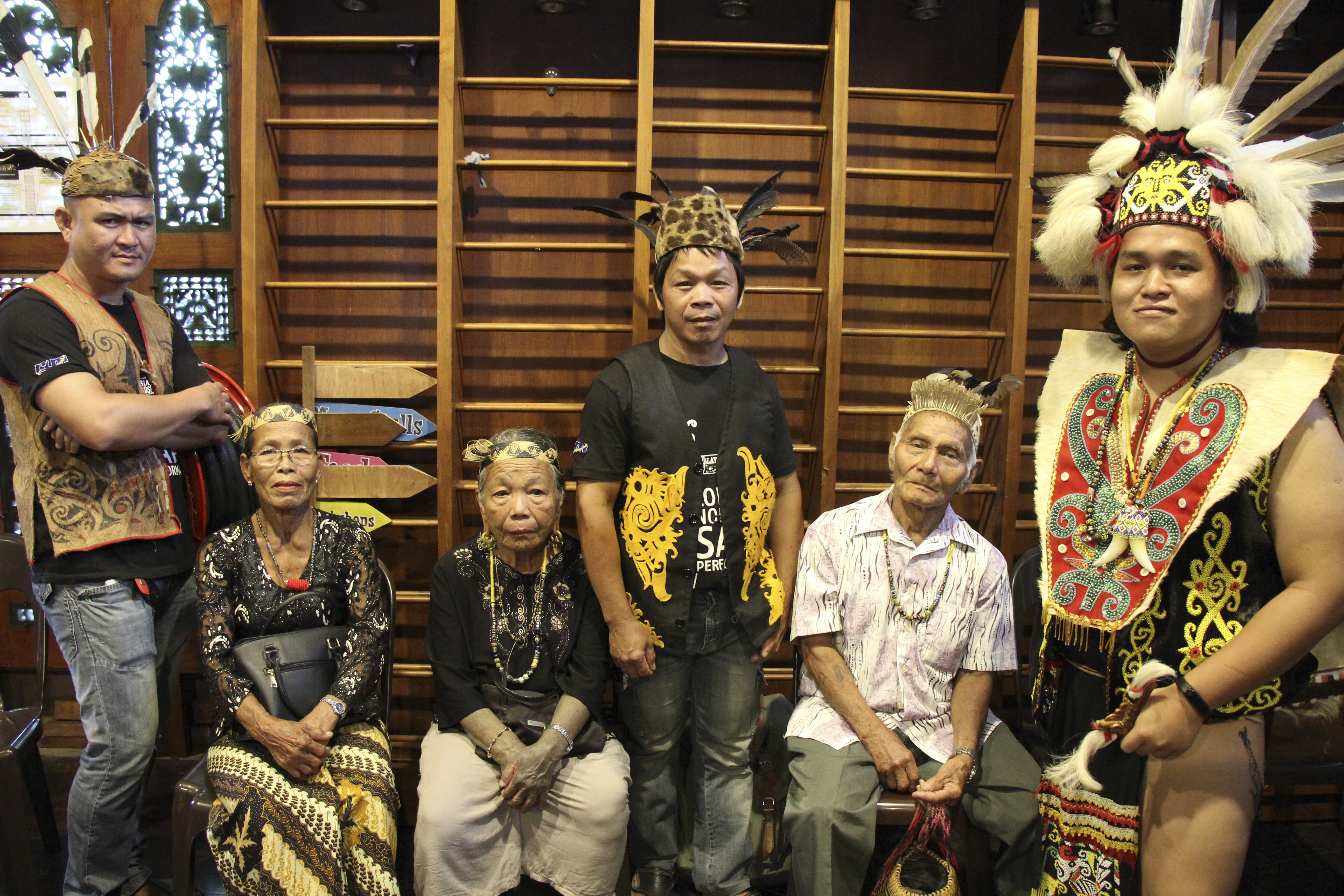 A mystical storyteller (far right) from the Kenyah tribe and other locals at the Borneo Jazz Festival, in Sarawak, Malaysia, in July 2019. Photo: John Brunton