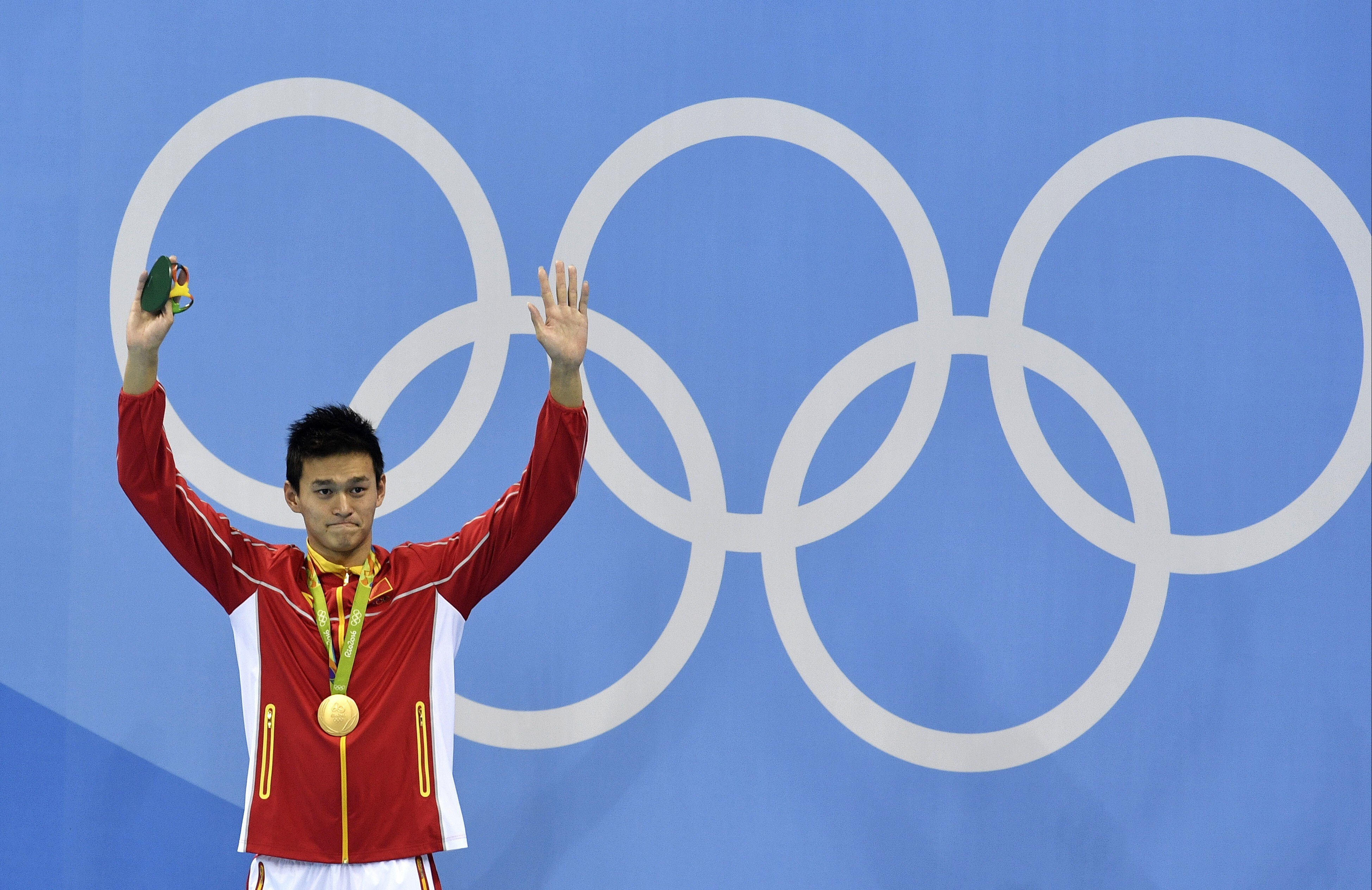 China’s Sun Yang celebrates with the gold medal in the men’s 200m freestyle at the 2016 Rio Olympics. Photo: AP