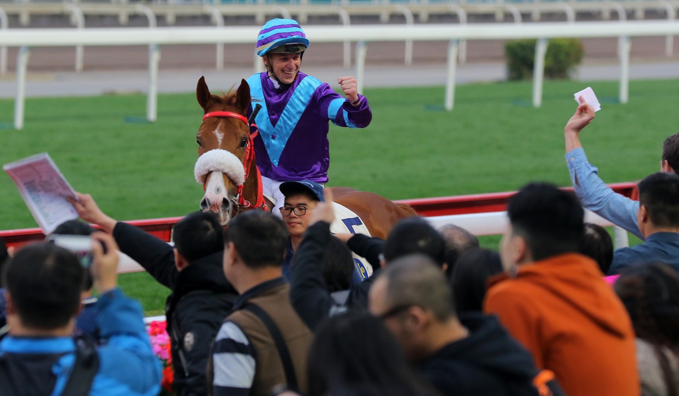 Tony Piccone rides a winner at Sha Tin.