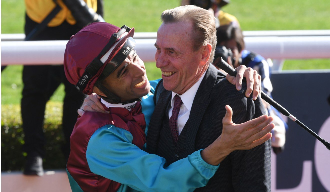 Joao Moreira gives John Size a hug after winning the Group One Hong Kong Sprint with Beat The Clock.