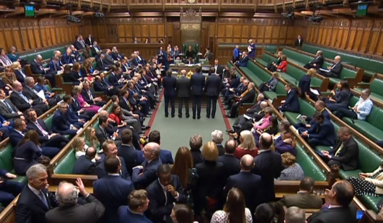 Tellers announce the result of a vote on the third reading of the European Union (Withdrawal Agreement) Bill in the House of Commons in London on Thursday. Photo: PRU via AFP