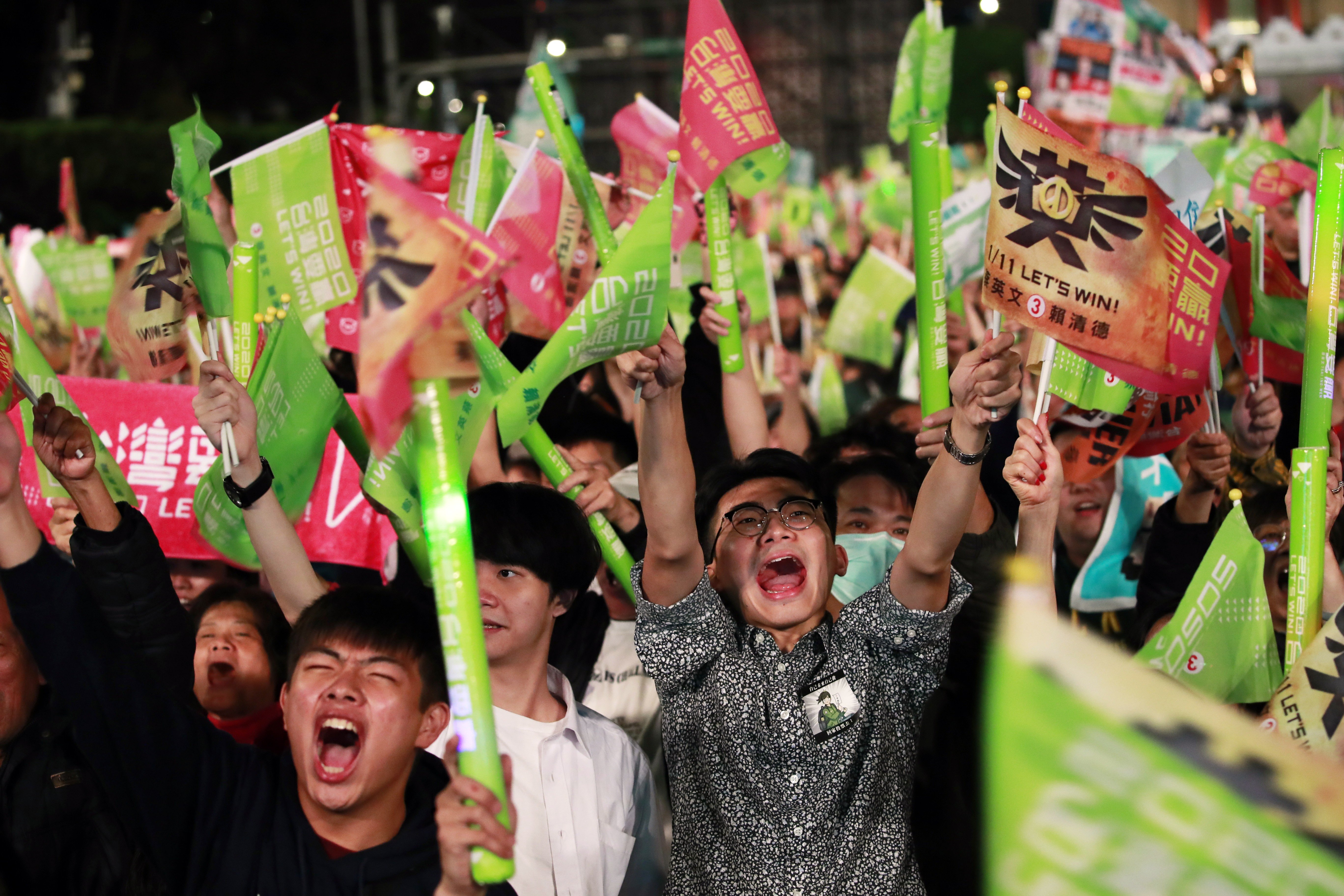 Supporters of Taiwan President Tsai Ing-wen at a final rally for the front-runner. Photo: EPA-EFE