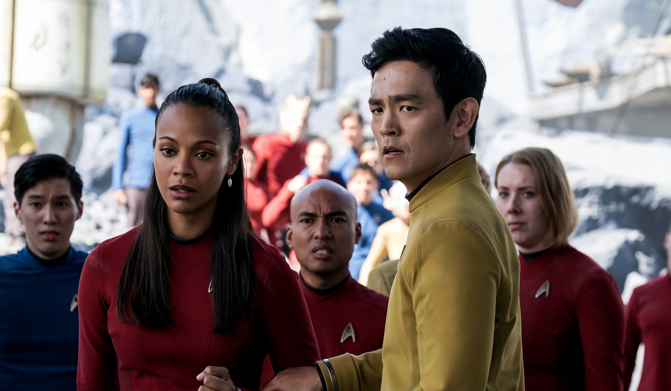 Zoe Saldana and John Cho (right) in a still from Star Trek Beyond.