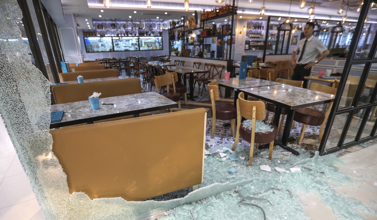 Glass panels at FL Fusion restaurant, under the Fulum Group, smashed by radical protesters in Sha Tin. Photo: Felix Wong