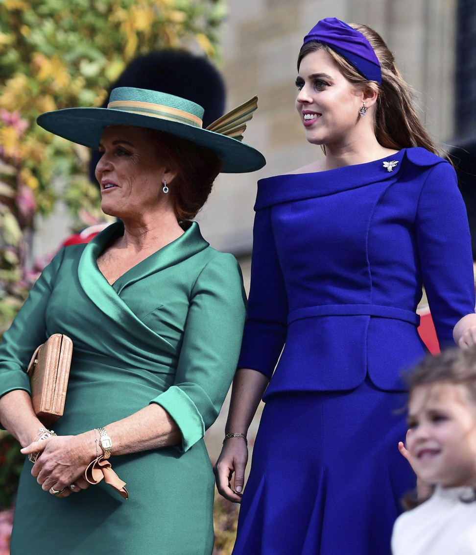 Britain's Princess Beatrice and her mother Sarah Ferguson leave after the wedding of Princess Eugenie of York and Jack Brooksbank at St George's Chapel, Windsor Castle, near London in October 2018. Photo: Pool via AP