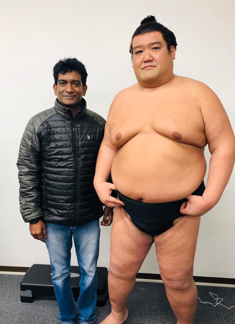 Rehabilitated sumo wrestler repays stablemaster with 1st