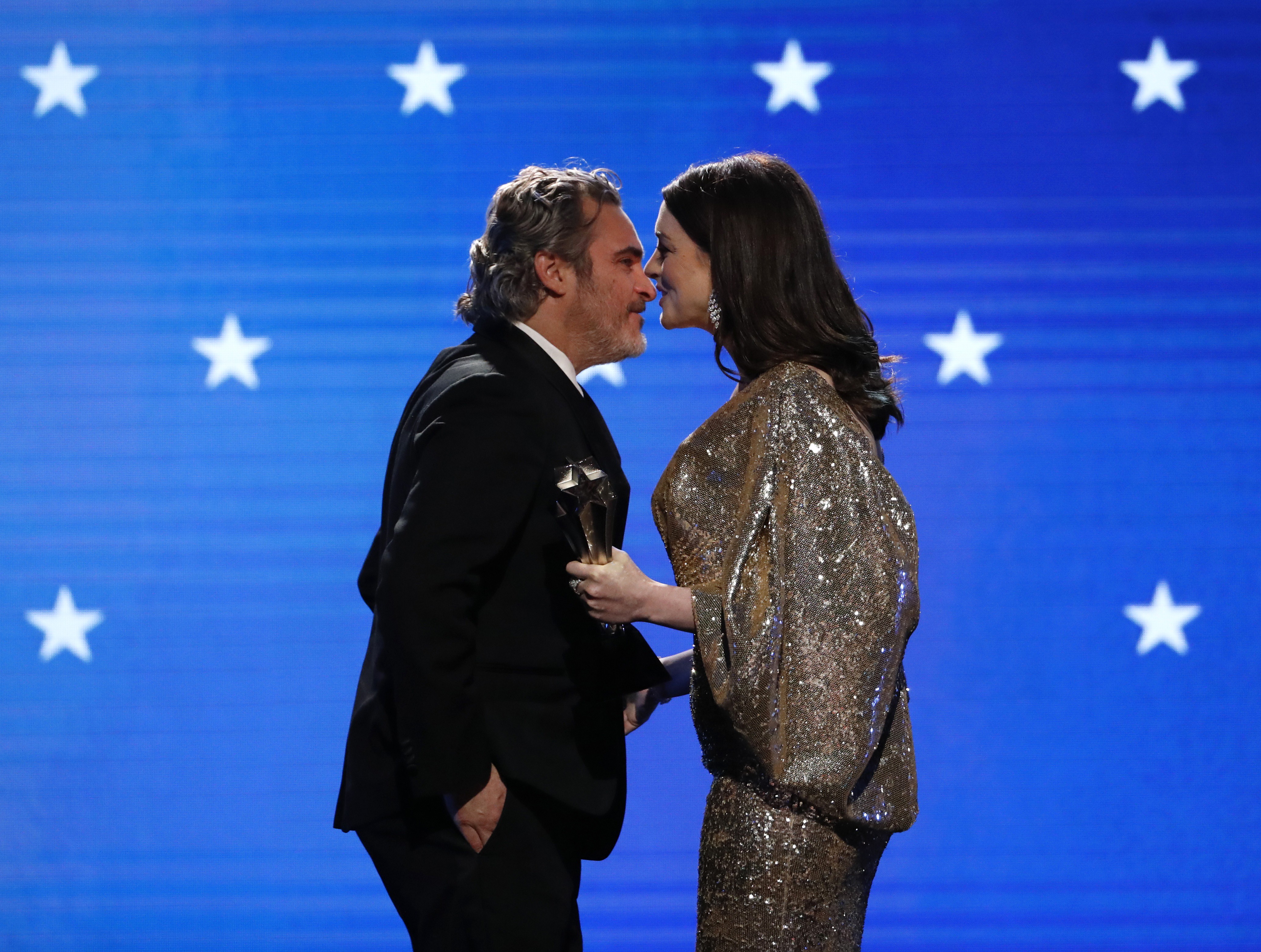 Anne Hathaway presents the best actor award to Joaquin Phoenix, for his role in Joker, at the 25th Critics Choice Awards – is an Academy Award on the cards next? Photo: Reuters