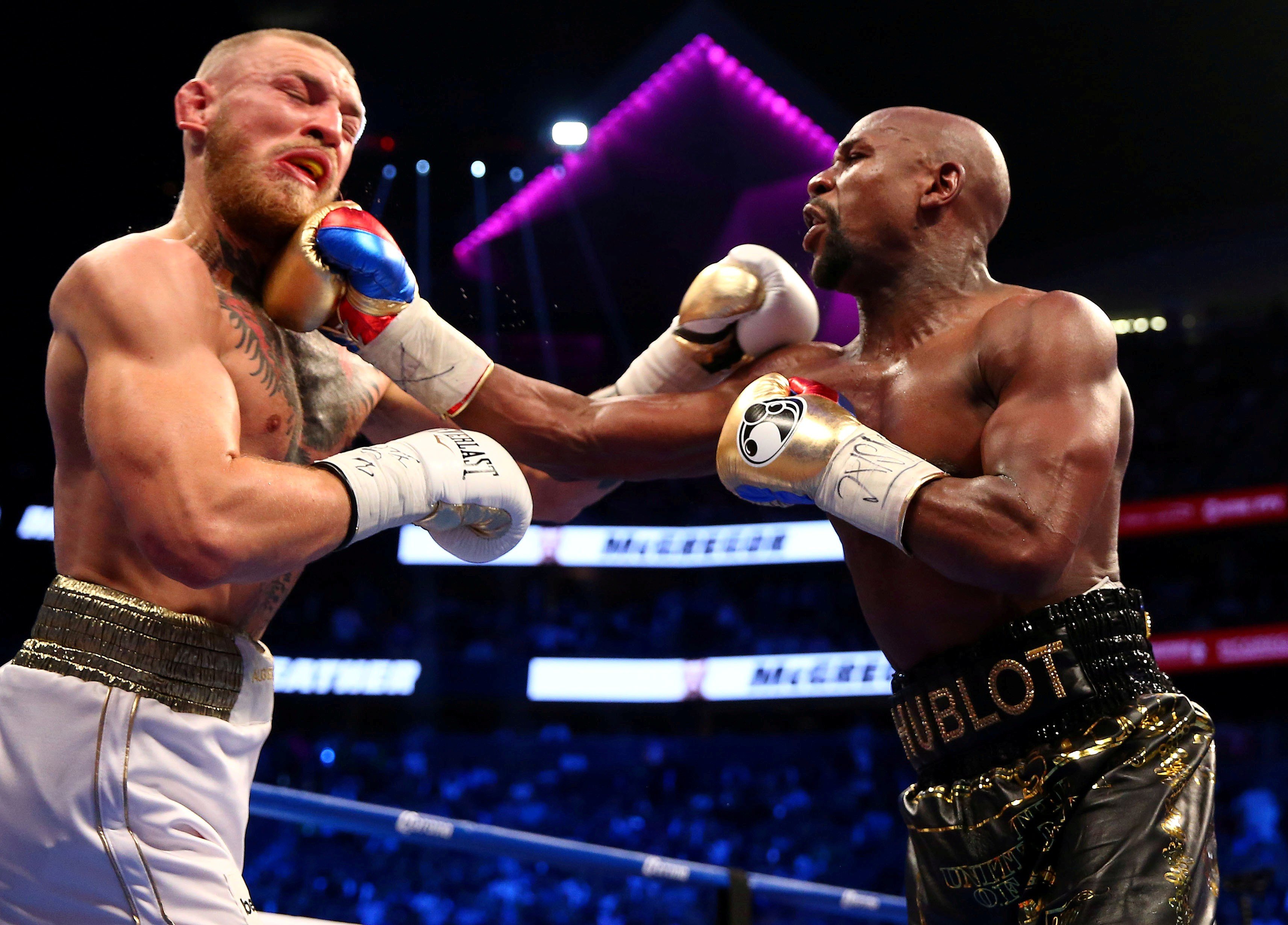 Conor McGregor (left) lost to Floyd Mayweather in his first professional boxing bout in 2017. Photo: USA Today