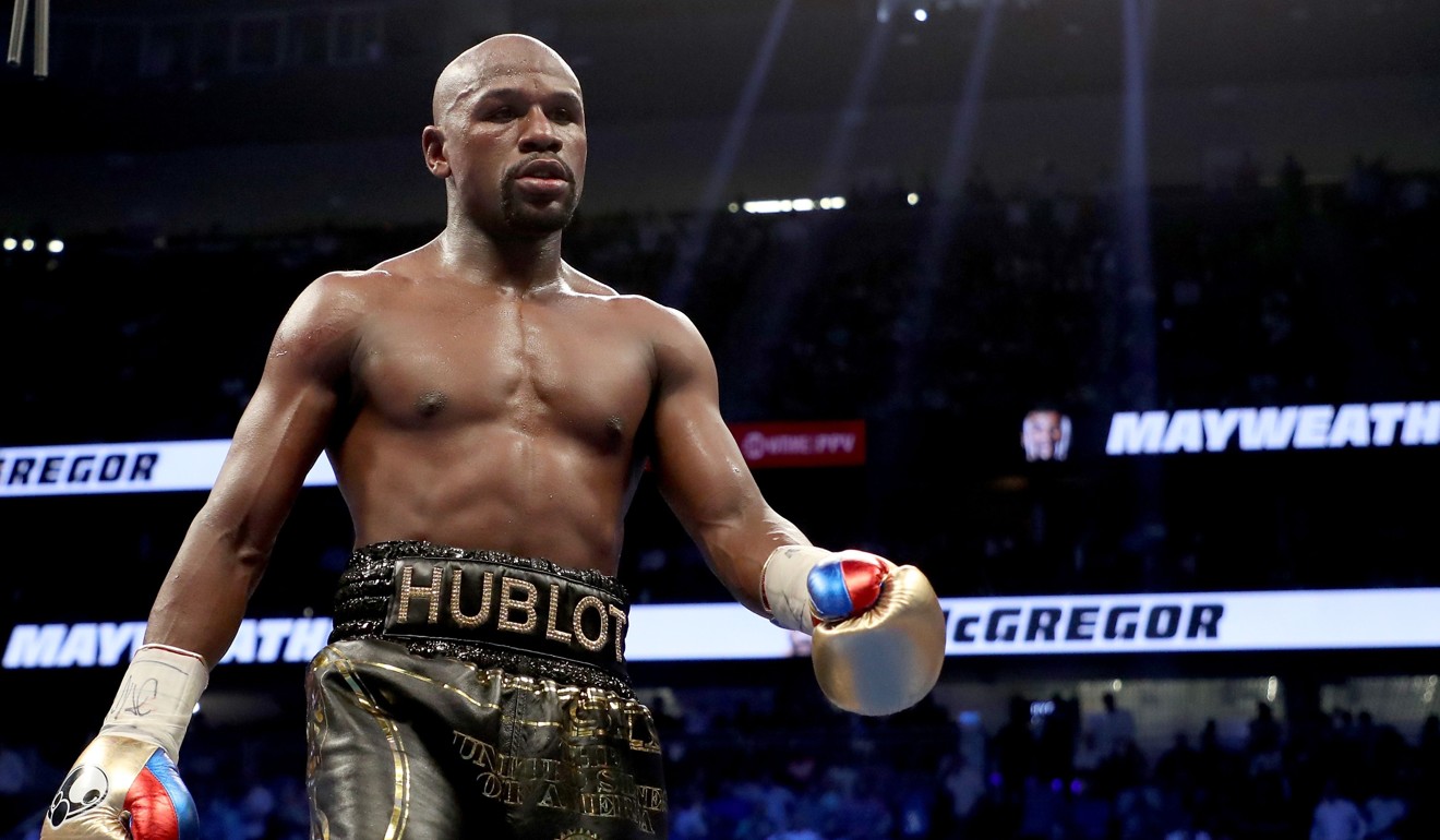 Floyd Mayweather walks to his corner during his win against Conor McGregor in their super welterweight boxing match in 2017. Photo: AFP