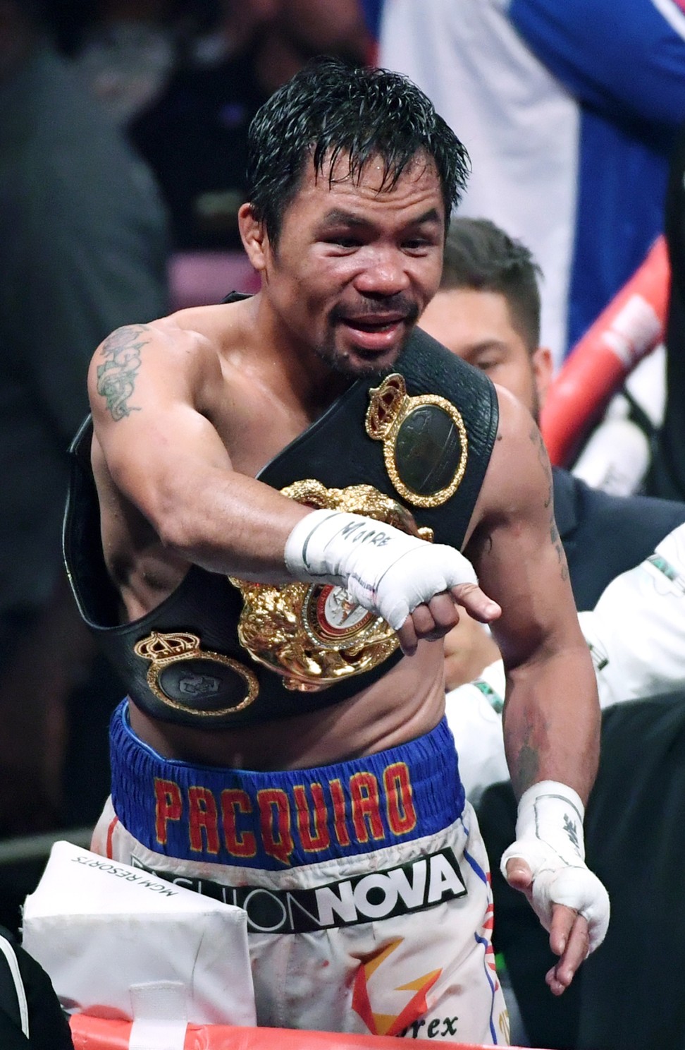 Pacquiao celebrates his split-decision victory over Keith Thurman in their WBA welterweight title fight in July 2019. Photo: AFP