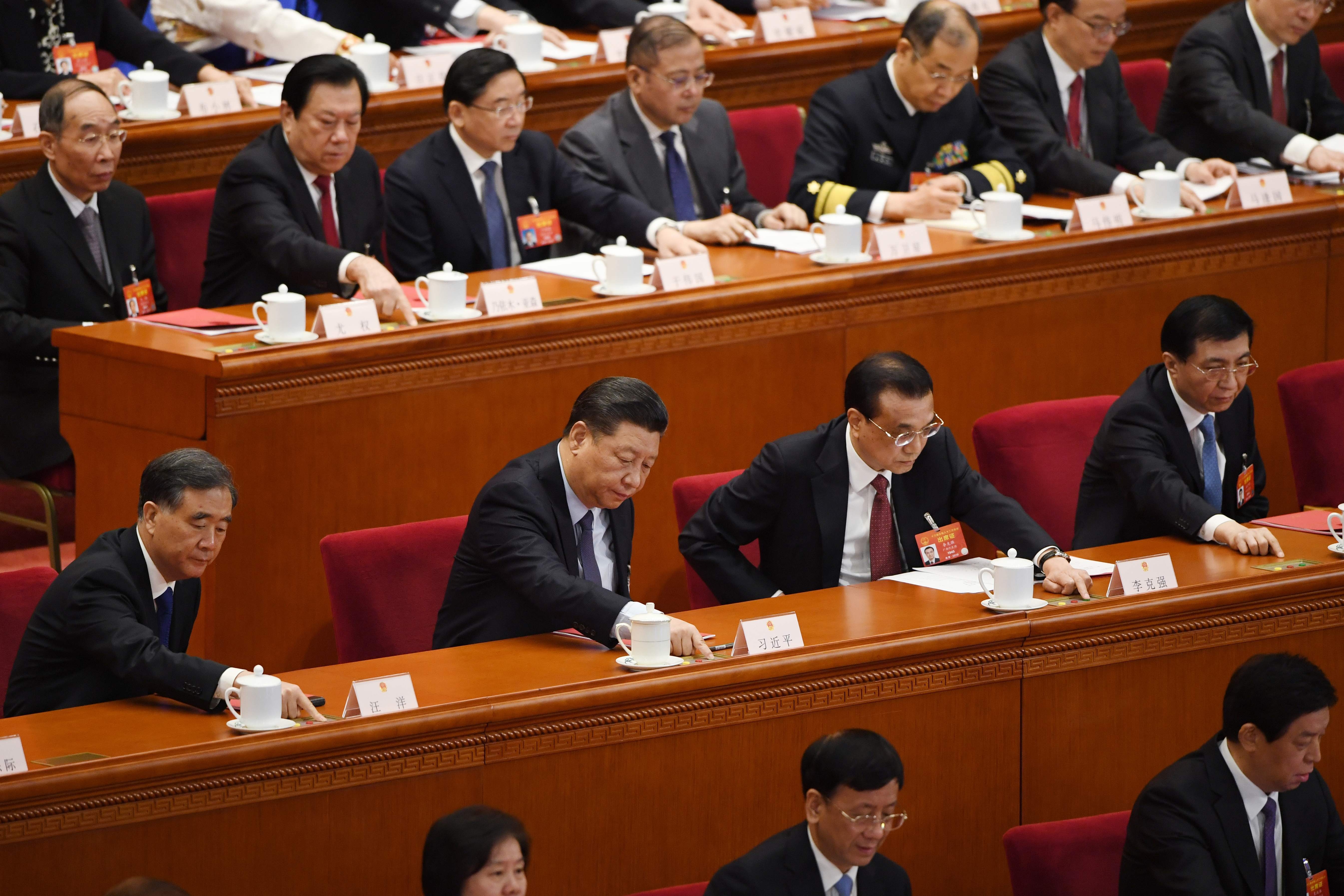 Chinese leaders, including President Xi Jinping and Premier Li Keqiang (centre), approving the fast-tracked Foreign Investment Law last year, possibly as an olive branch in trade talks with the US. Photo: AFP