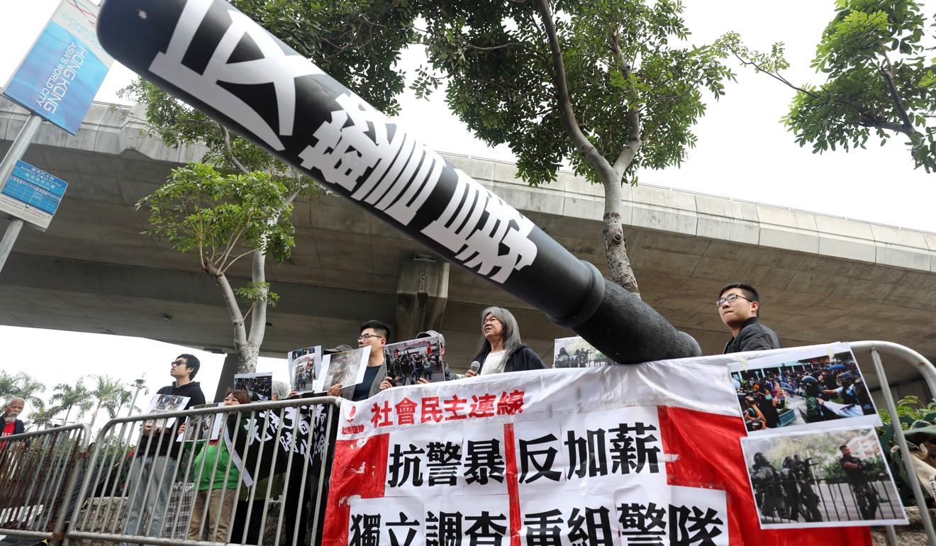 The League of Social Democrats stage a protest as they wait for chief of police Chris Tang. Photo: Xiaomei Chen
