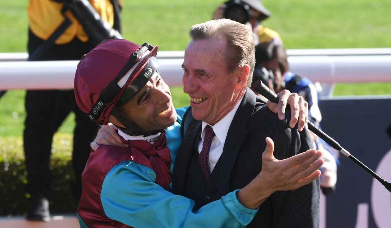 Joao Moreira celebrates Beat The Clock’s win with trainer John Size.