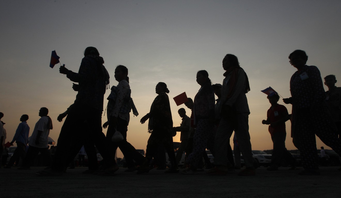 Cambodians head to a groundbreaking ceremony in Kampong Speu province, south of Phnom Penh, for the country's first expressway, which is being funded by China. . Photo: AP