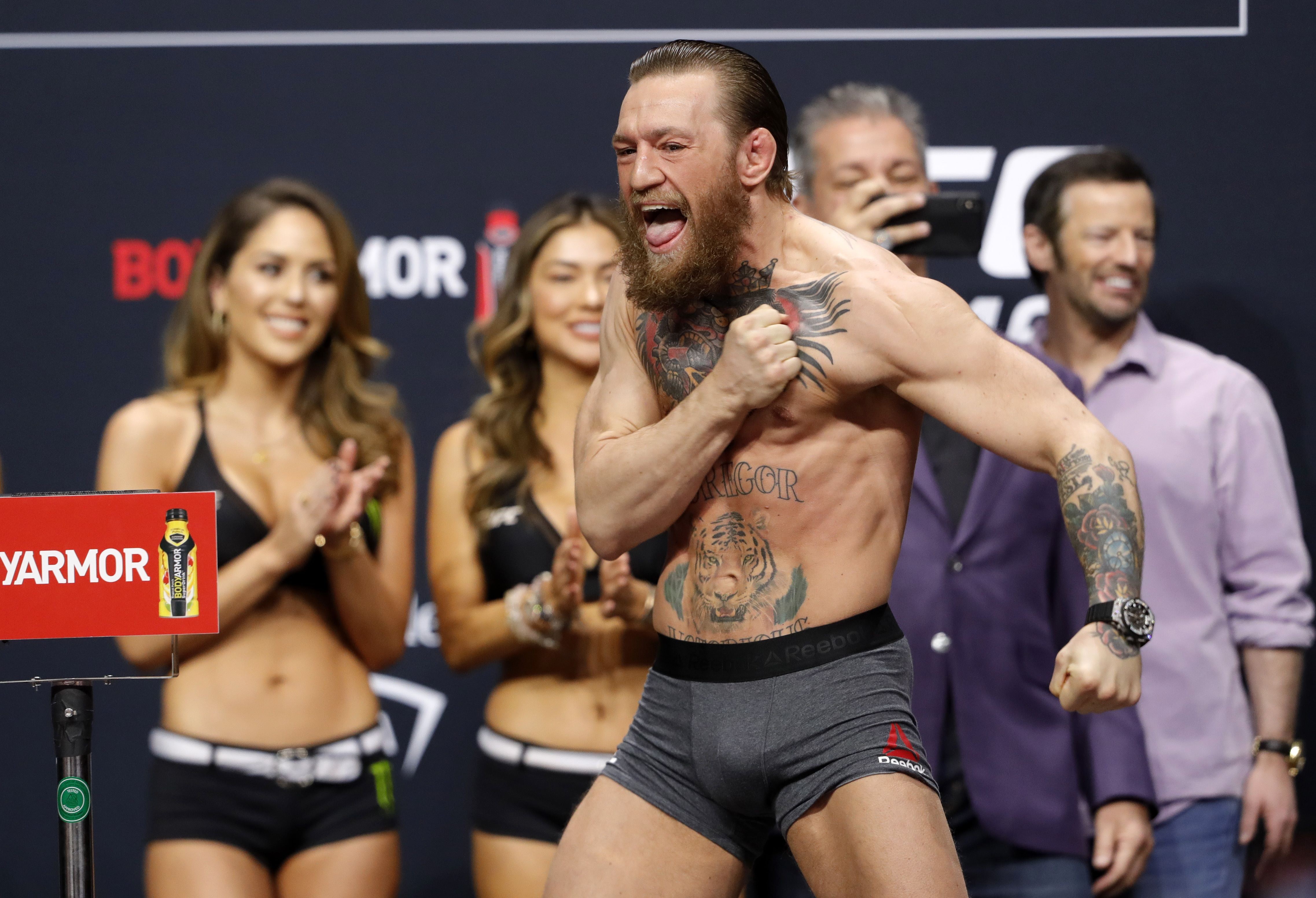 Conor McGregor poses on stage during a ceremonial weigh-in for UFC 246. Photo: AFP