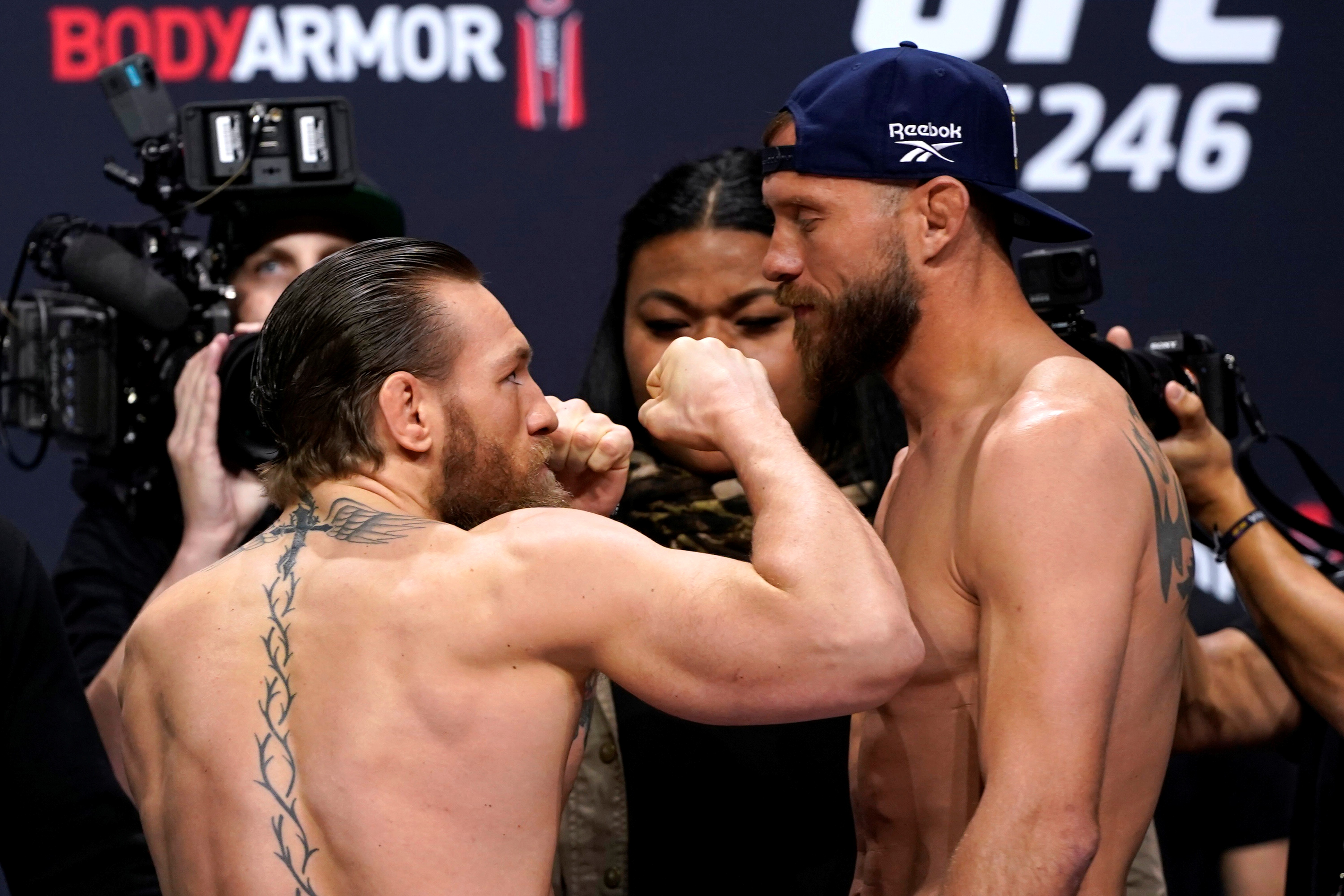 Conor McGregor and Donald Cerrone go head to head during the UFC 246 weigh-in. Photos: Reuters