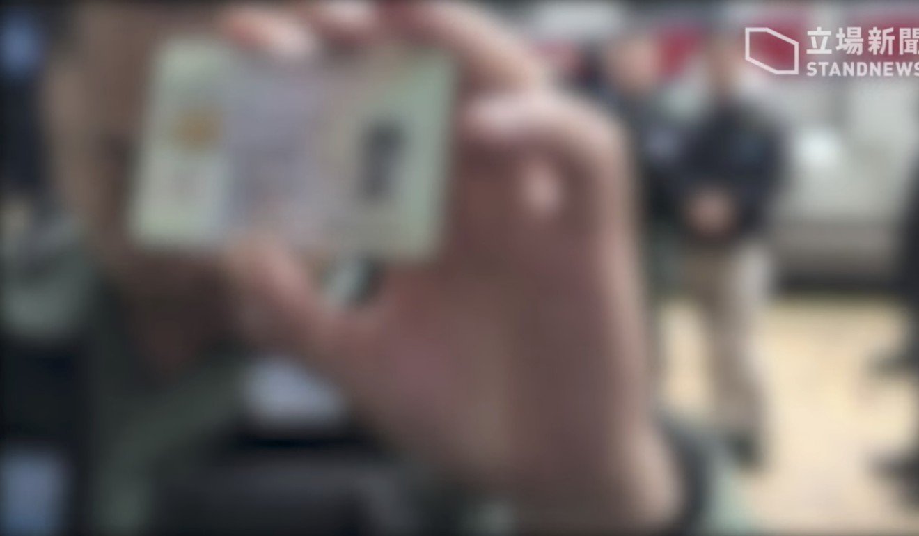 Police have been accused of a privacy breach by deliberately showing an ID card to a camera. Photo: Stand News