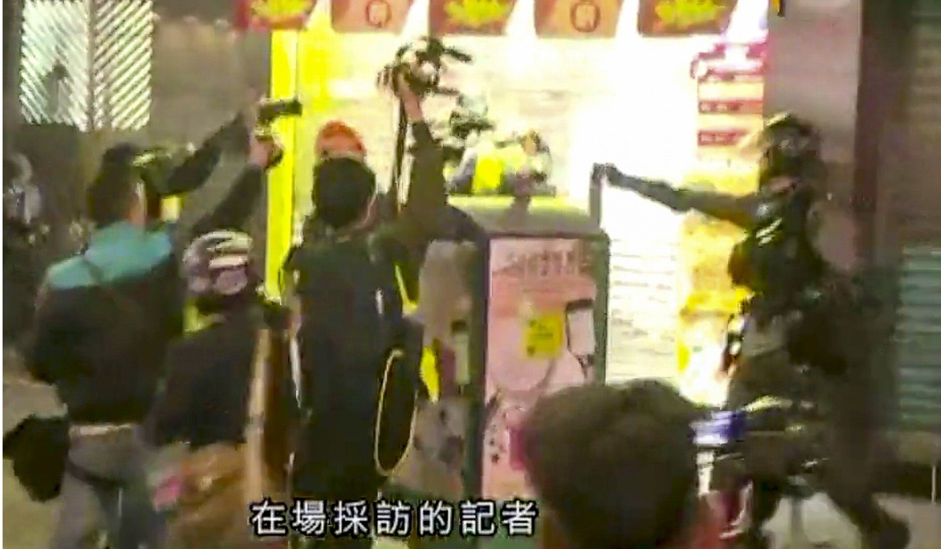 Police use pepper spray in Mong Kok on Sunday night. Photo: Now TV