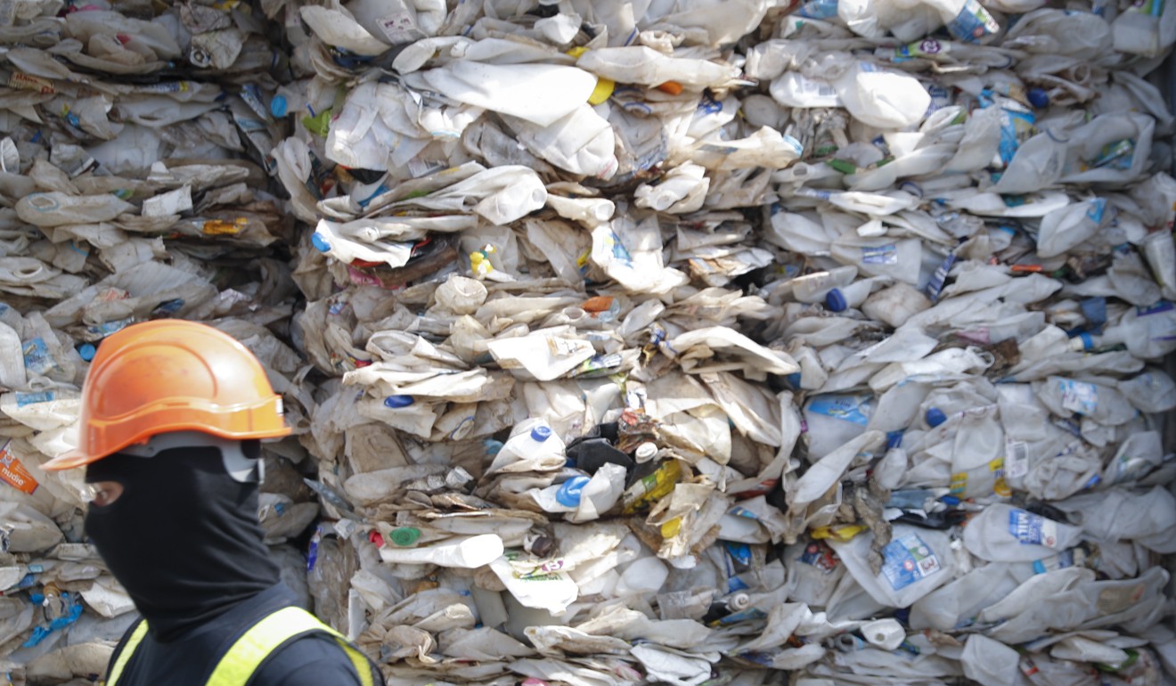 A container is filled with plastic waste from Australia, in Port Klang, Malaysia. Photo: AP Photo