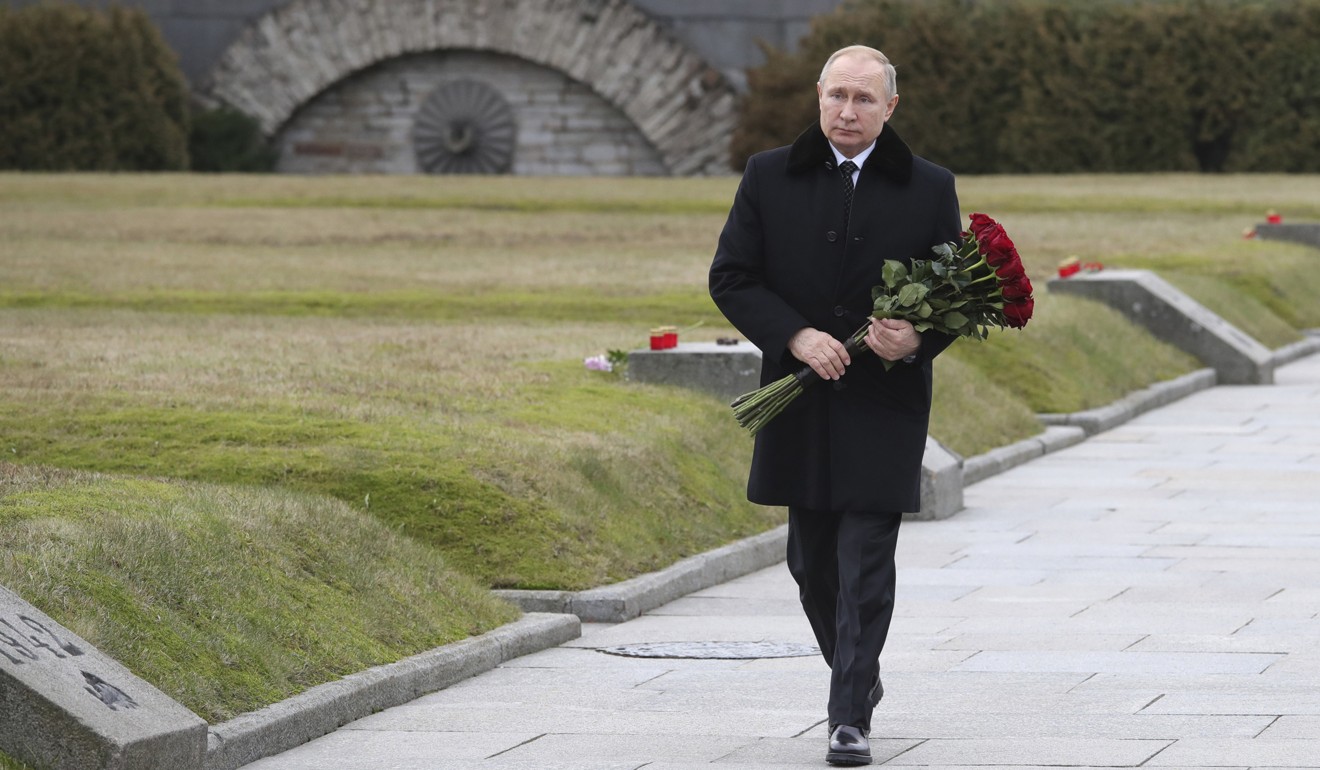 President Vladimir Putin attends a wreath laying commemoration ceremony for the anniversary of the Leningrad siege in World War Two. Photo: AP