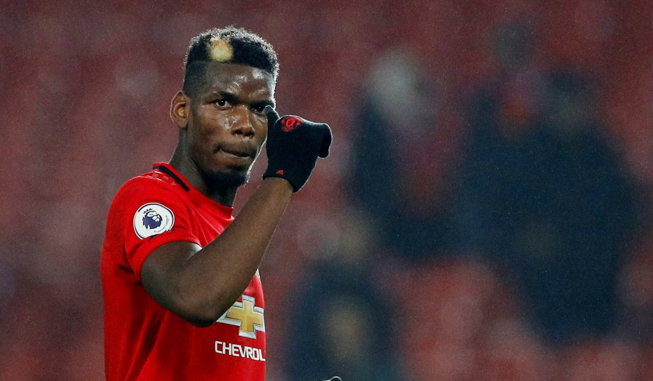 Paul Pogba acknowledges fans after beating Newcastle United on Boxing Day. He has not played since. Photo: Reuters