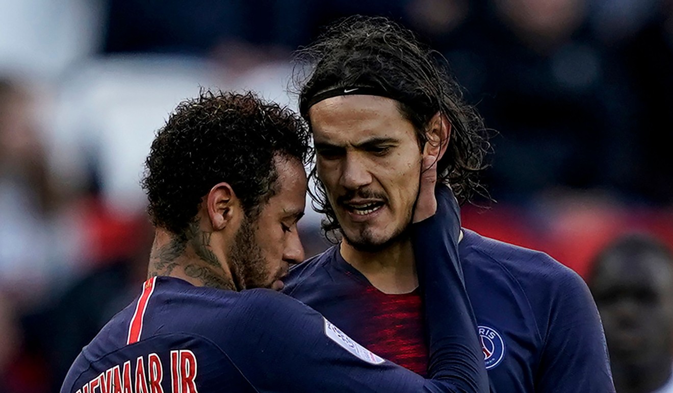 Paris Saint-Germain’s Edinson Cavani is embraced by Neymar. Photo: AFP