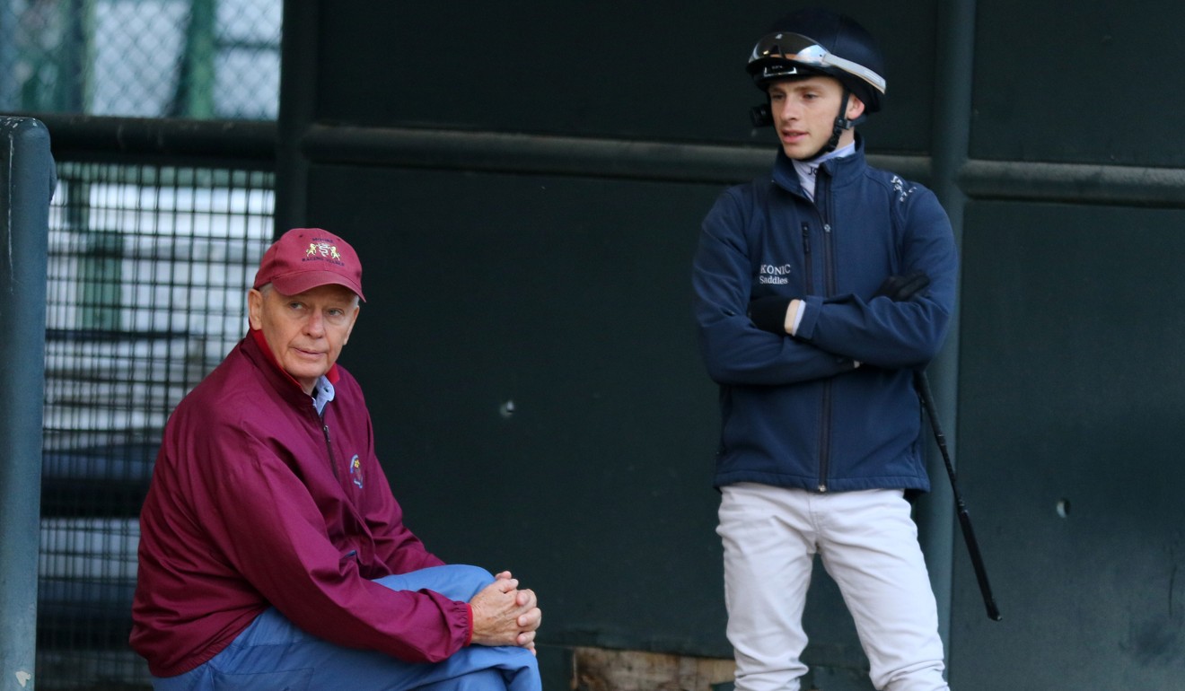 Trainer John Moore and jockey Lyle Hewitson at trackwork earlier this month.