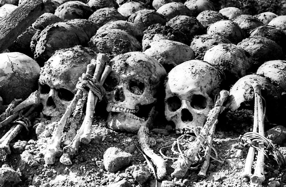 Bearing witness to the brutality of the Khmer Rouge, a pile of skulls rests in a “killing field” outside Phnom Penh in this March 1980 file photo. Photo: AP