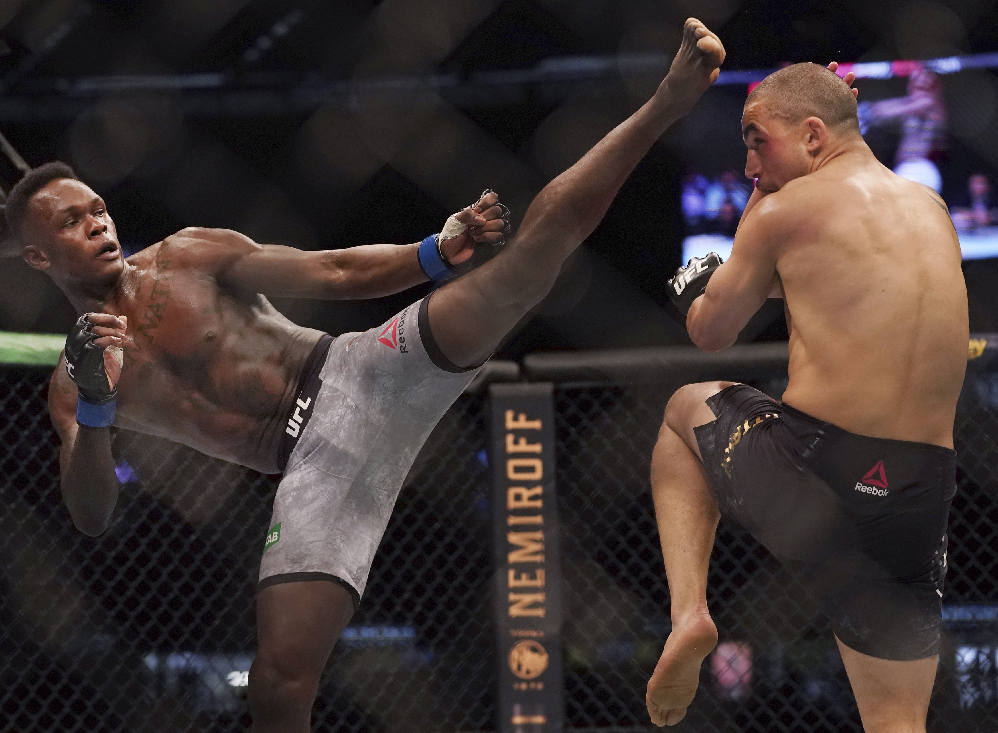 Adesanya wins the middleweight title against Robert Whittaker at UFC 243 in Melbourne, Australia in 2019. Photo: AP