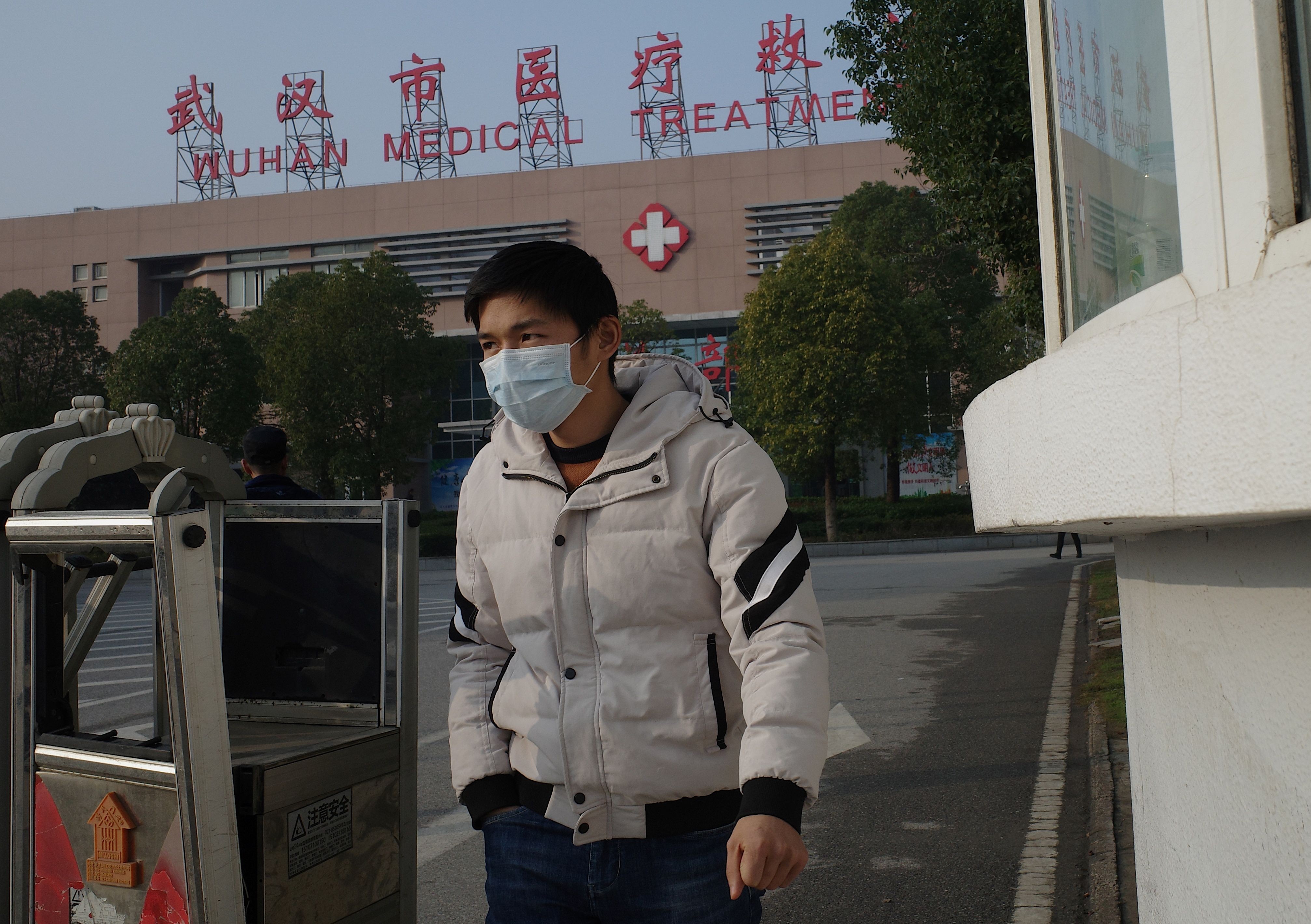 A man leaves a medical centre in Wuhan, where the coronavirus is thought to have originated. Photo: AFP