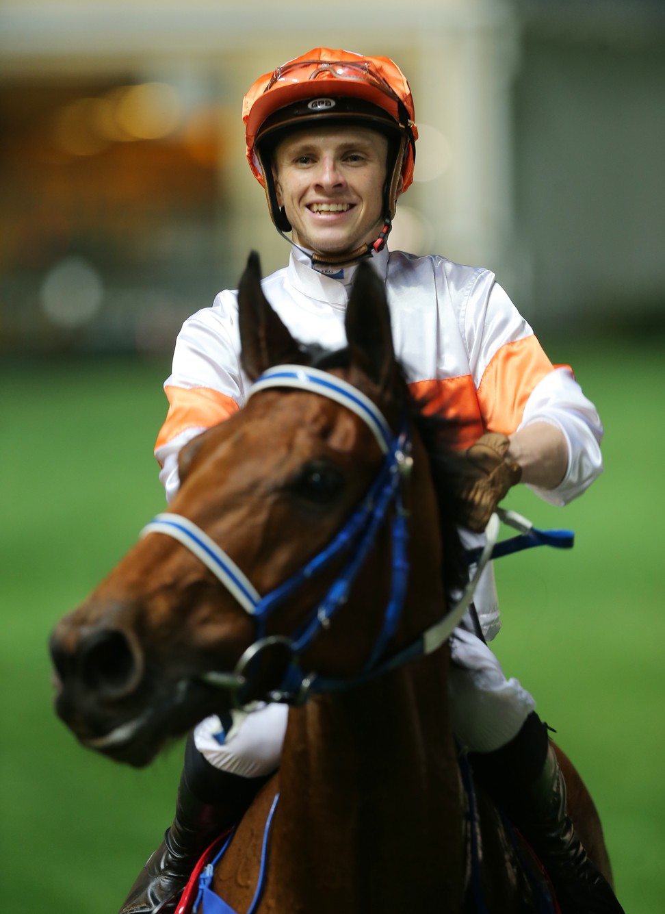 Lyle Hewitson is all smiles as he returns to scale after winning with Kiram.