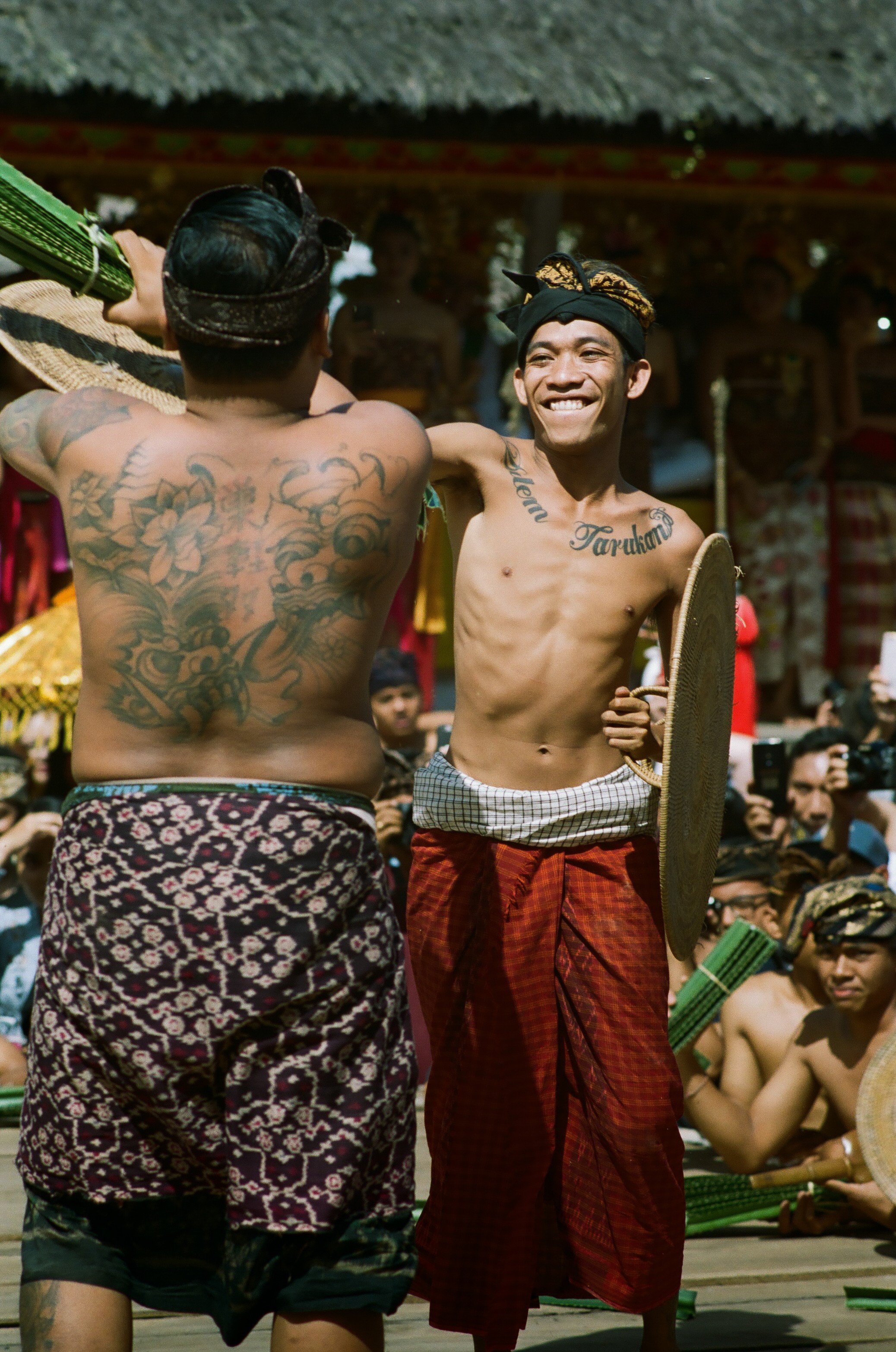 Two members of Bali’s indigenous Bali Aga tribe take part in the pandan wars, or Makare-kare, a series of ritual duels that honour Batara Indra, the Vedic god of war. The traditional combat, part of a harvest festival, has begun drawing tourists. Photo: Daniel Darmawan