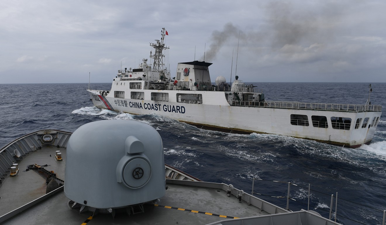 A China Coast Guard ship is seen from an Indonesian Naval ship during a patrol at Indonesia's exclusive economic zone sea in the north of Natuna island, Indonesia on January 11. Photo: Reuters