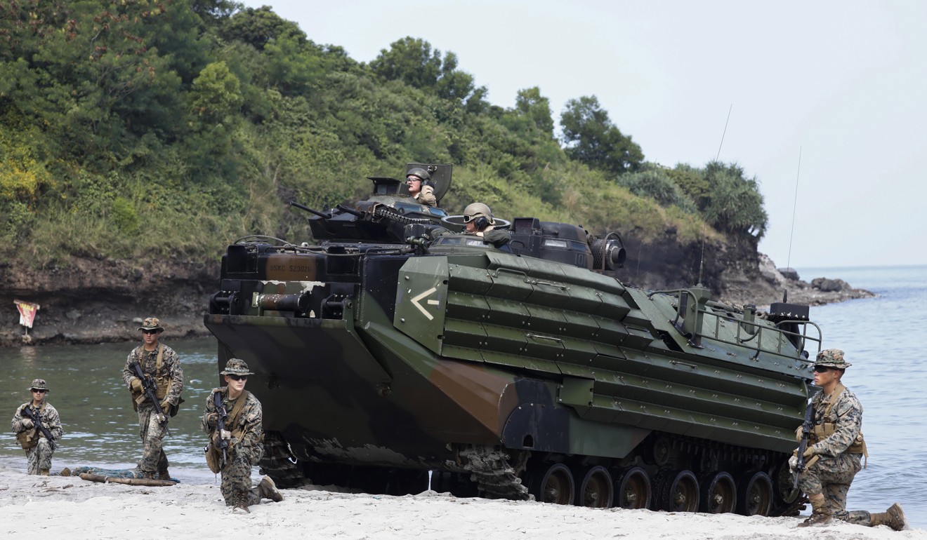 US Marines take part in an amphibious landing exercise with Philippine and Japanese counterparts in Cavite province, south of Manila. Photo: EPA