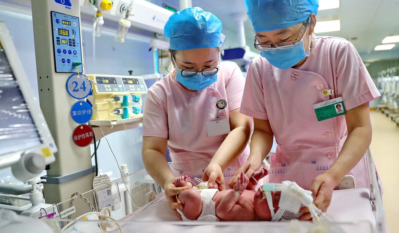 Nurses take care of a newborn baby at a hospital in Qinhuangdao in Hebei province on January 24. The statistics bureau said China had 15.23 million births in 2018, but the Health Statistics Yearbook recorded only 13.62 million. Photo: Xinhua