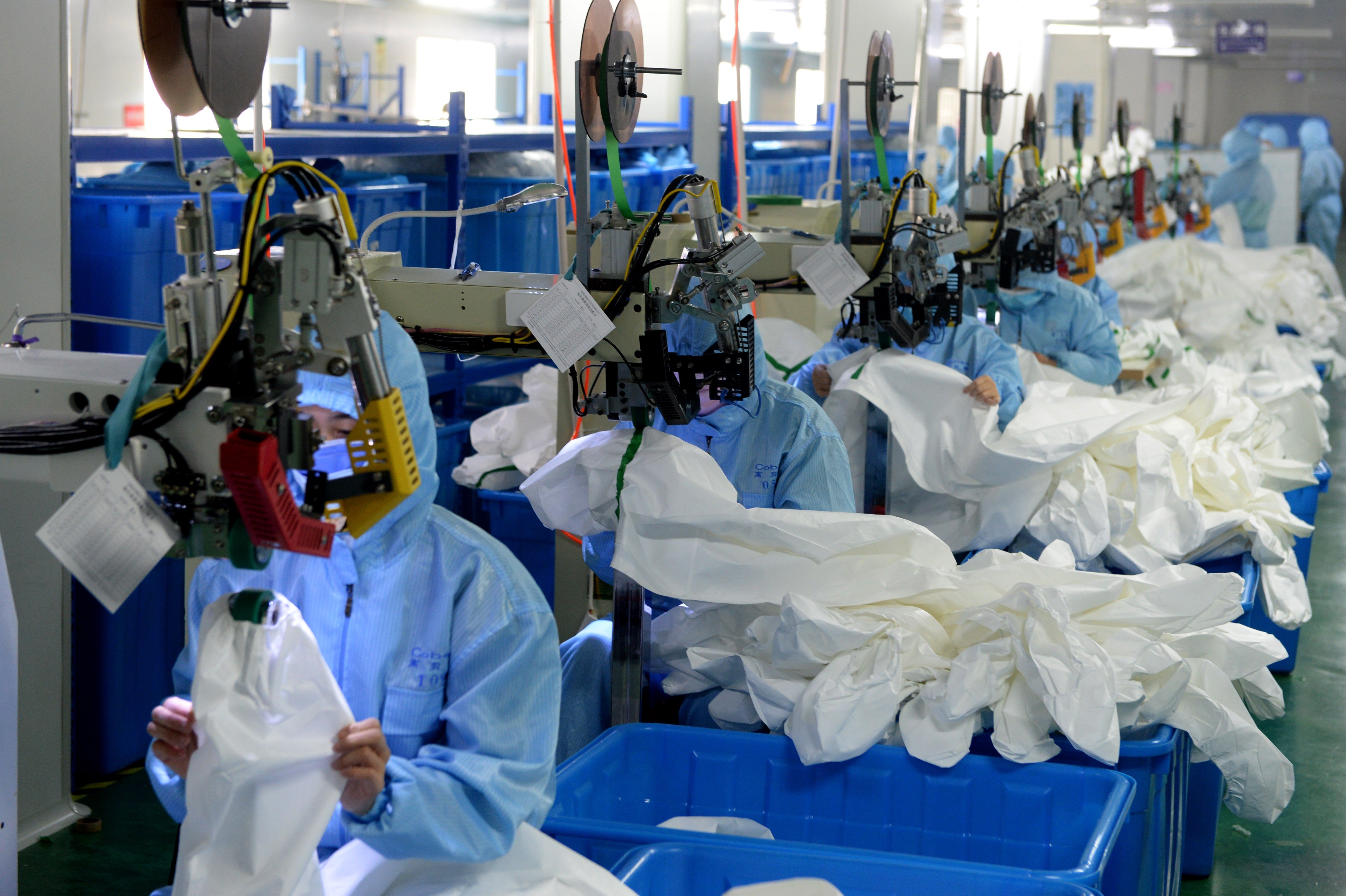 Demand for protective gear for medical staff tackling the coronavirus outweighs China’s domestic supply. Photo: Xinhua