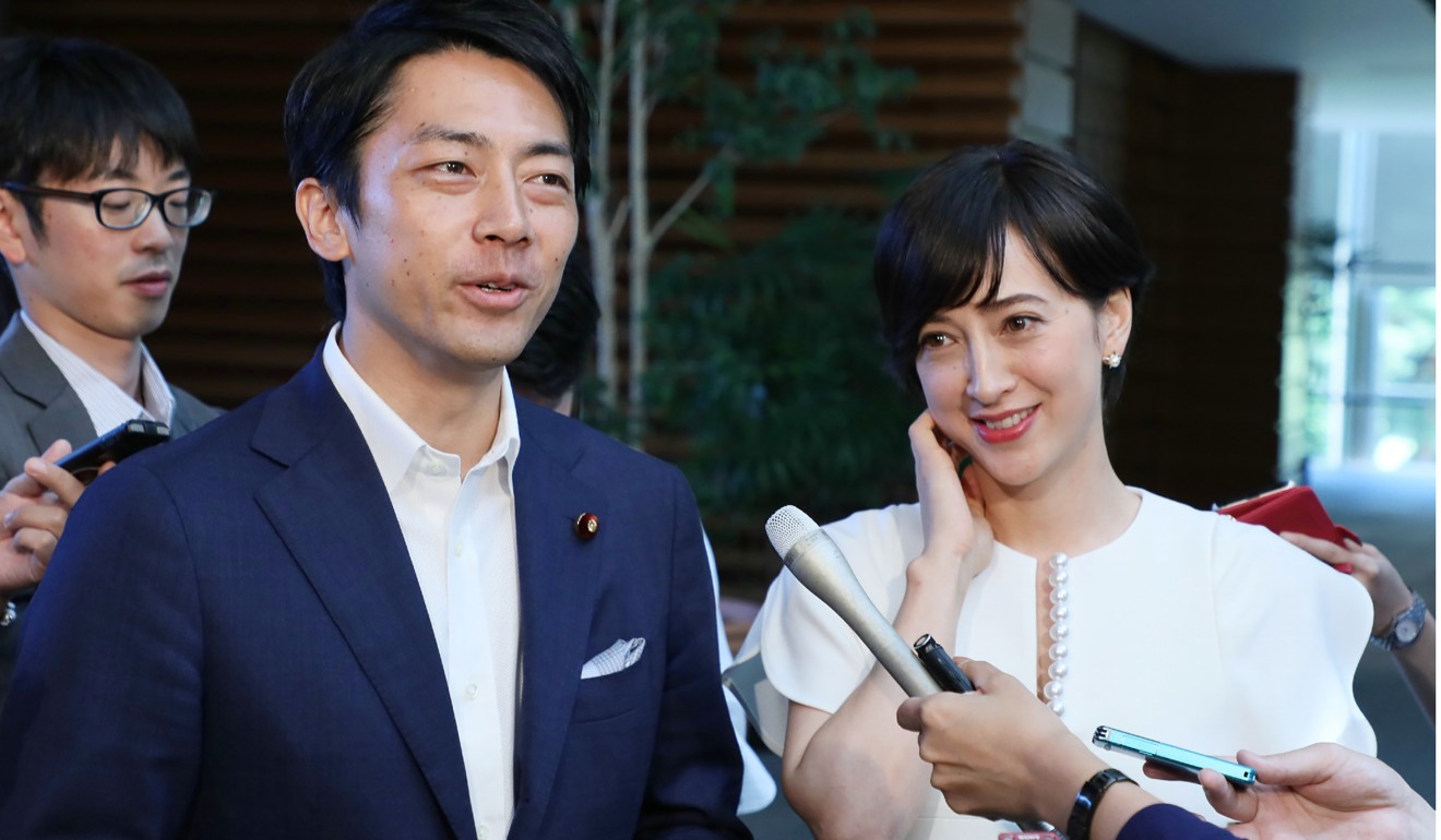 Japanese politician Shinjiro Koizumi and his wife, Christel Takigawa. Koizumi is the first serving cabinet minister to take paternity leave. Photo: AFP