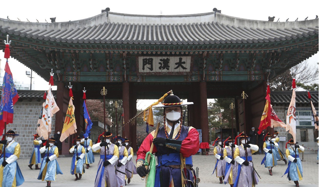 The traditional changing of the guard ceremony in front of the Deoksu Palace in Seoul, South Korea. Photo: AP