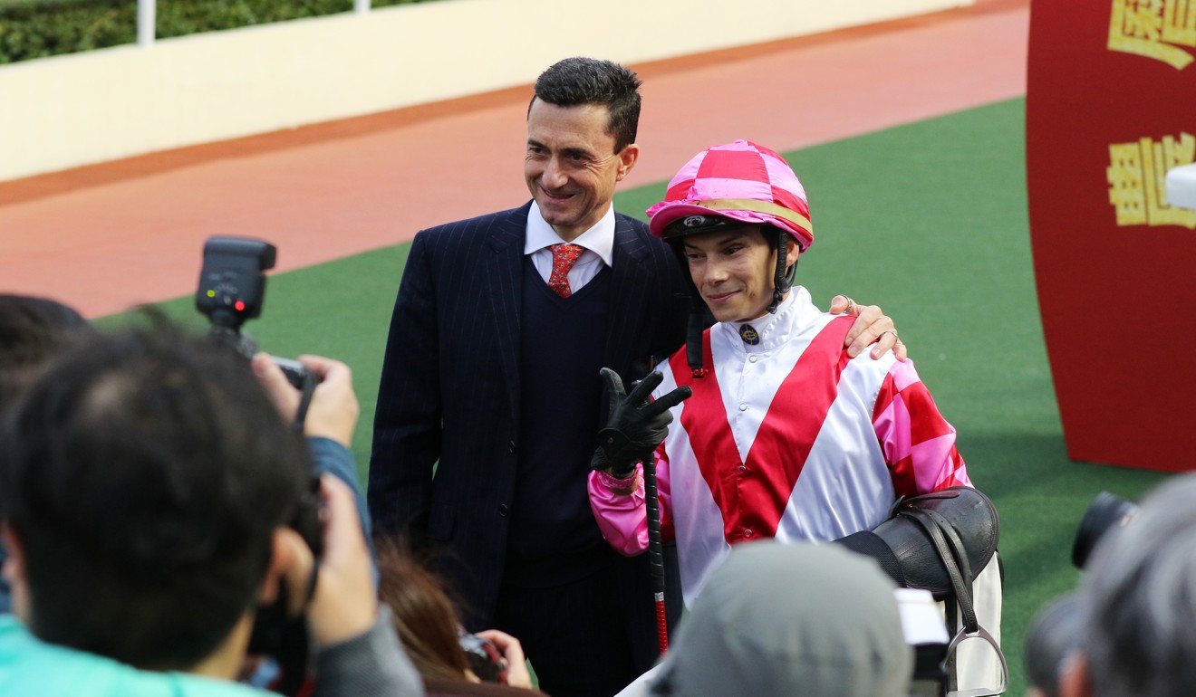 Douglas Whyte with jockey Alexis Badel after winning with Super Wealthy at Sha Tin.