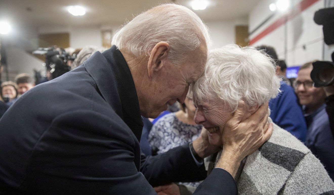Joe Biden greets an attendee during a campaign event in Cedar Rapids, Iowa. Photo: Bloomberg