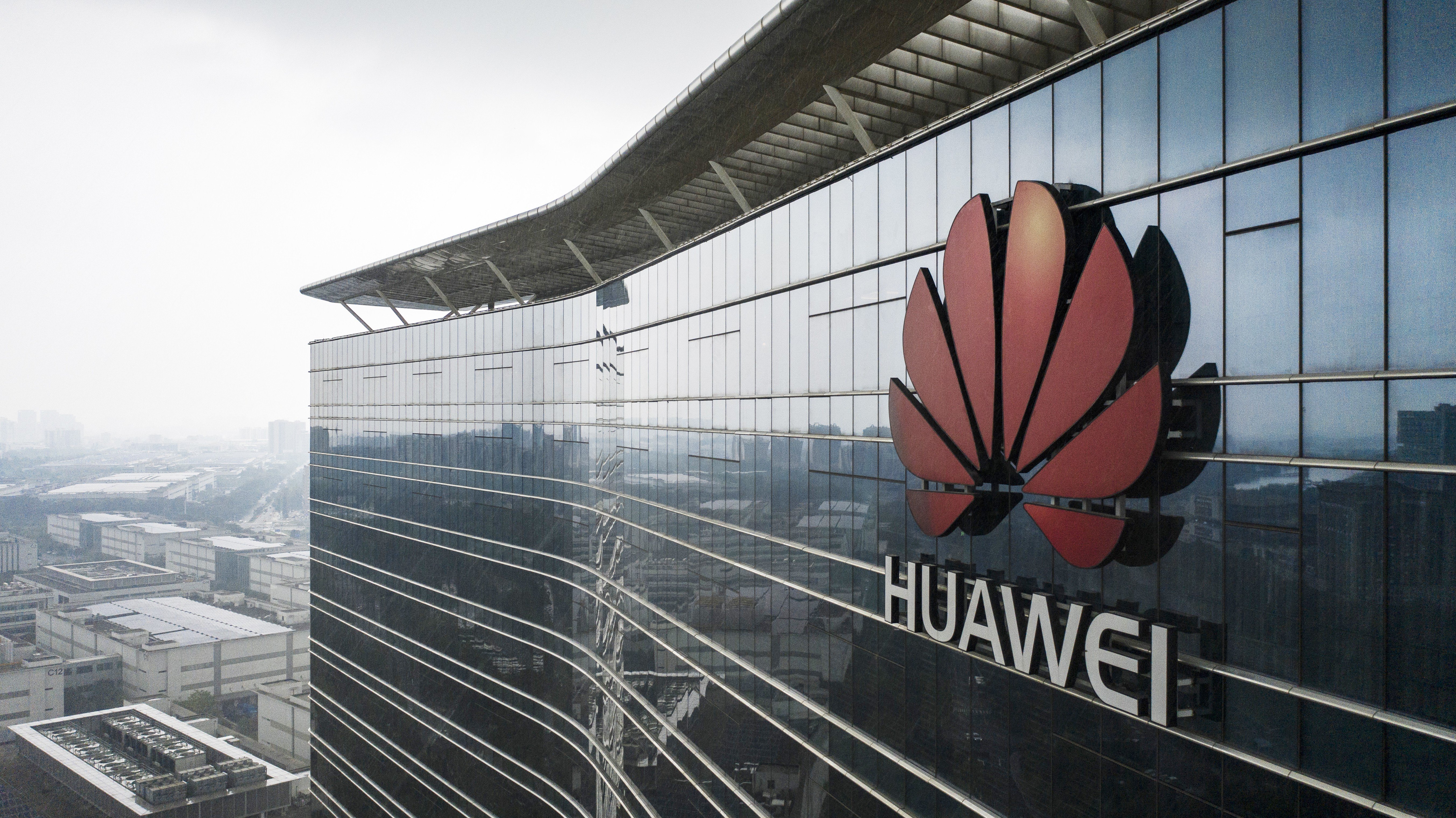 The logo of Huawei Technologies is displayed atop an office building at the company's production facility in Dongguan, Guangdong province, on May 23, 2019. Photo: Bloomberg