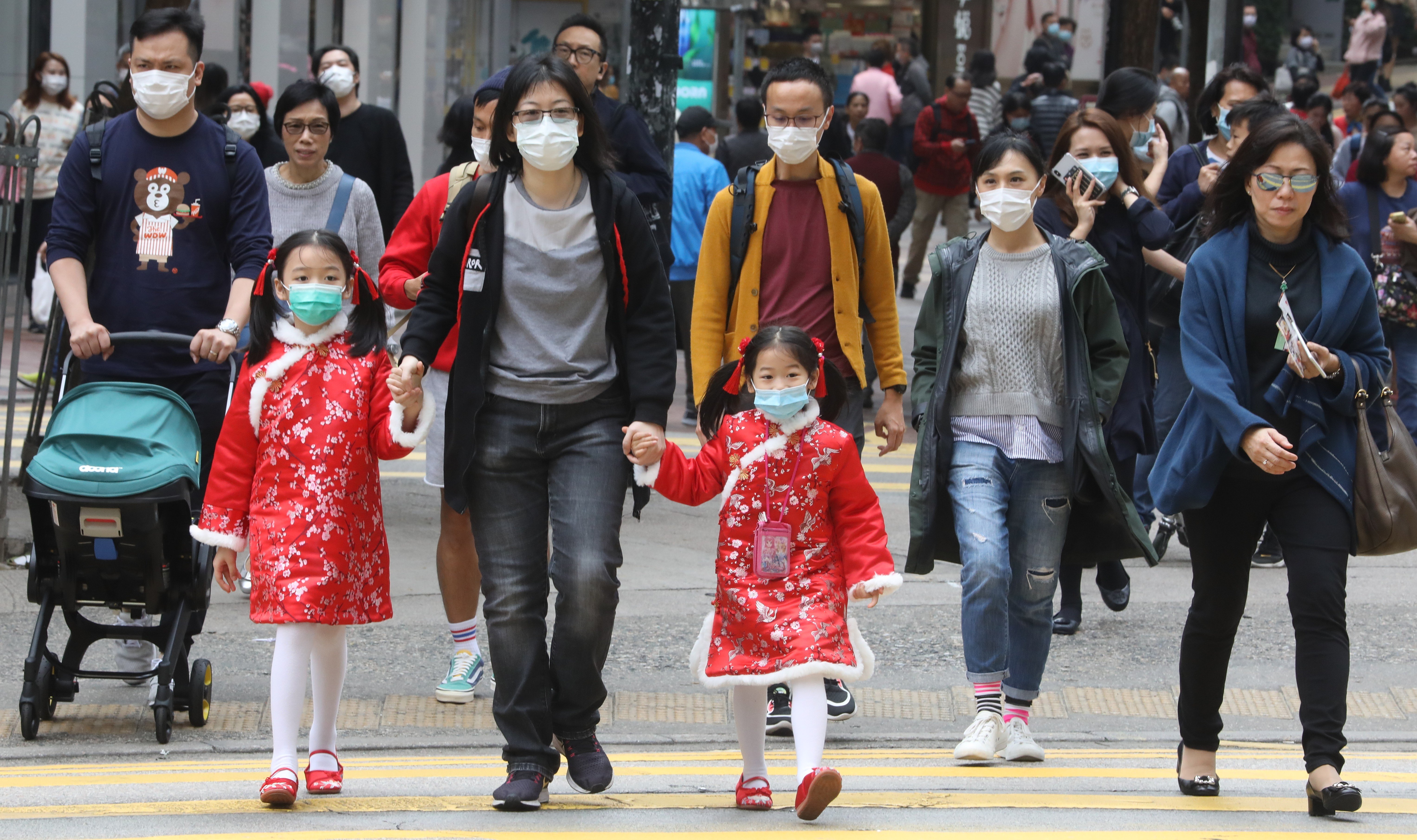 Pedestrians with masks in Hong Kong’s Causeway Bay. Photo: Dickson Lee